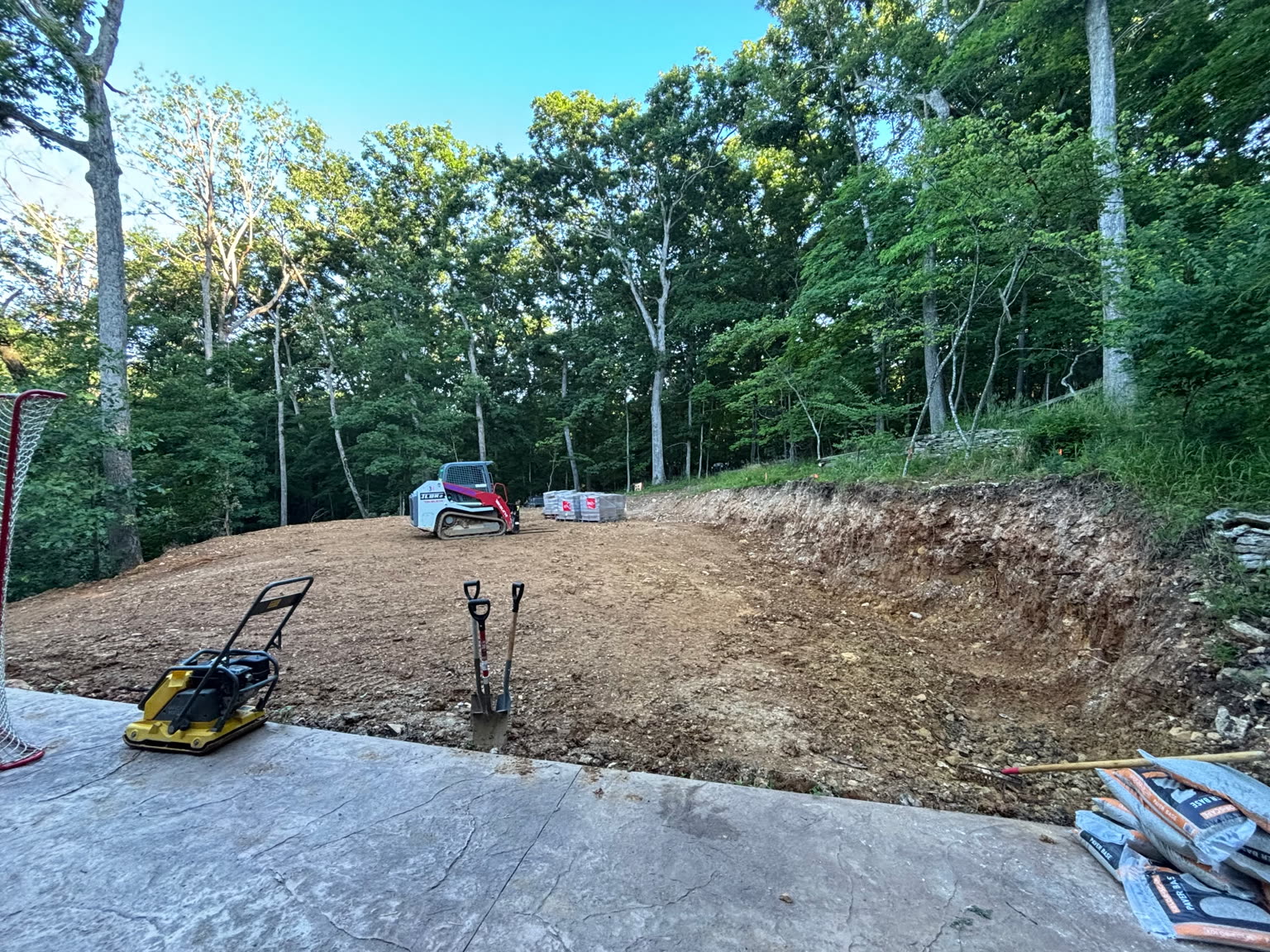 Grading a cleared hillside lot